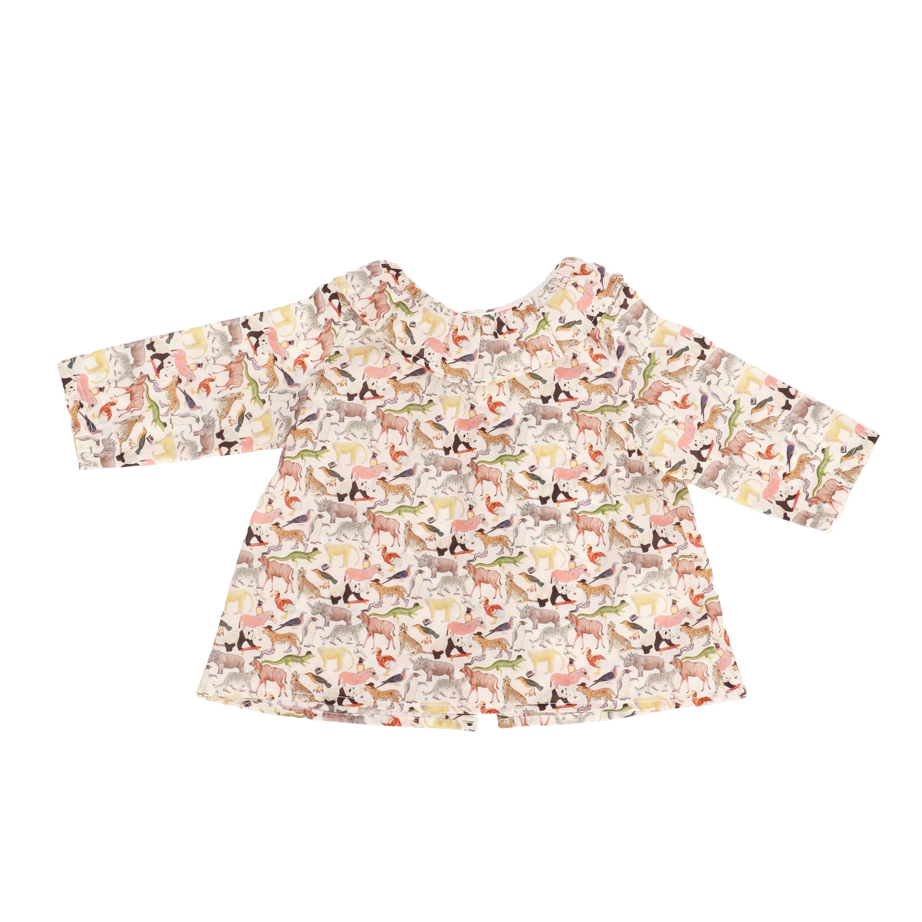 Animal patterned blouse on a white background